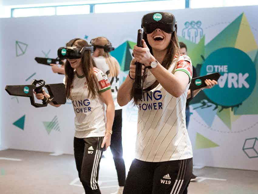 Friend group playing VR as a fun day out